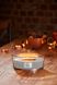 Ароматическая свеча с ароматом леса, пряной гвоздики и мускуса Woodwick Ellipse Sacred Smoke 453 г